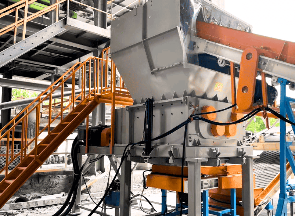 Large-scale quad-shaft shredder installed on-site for a customer